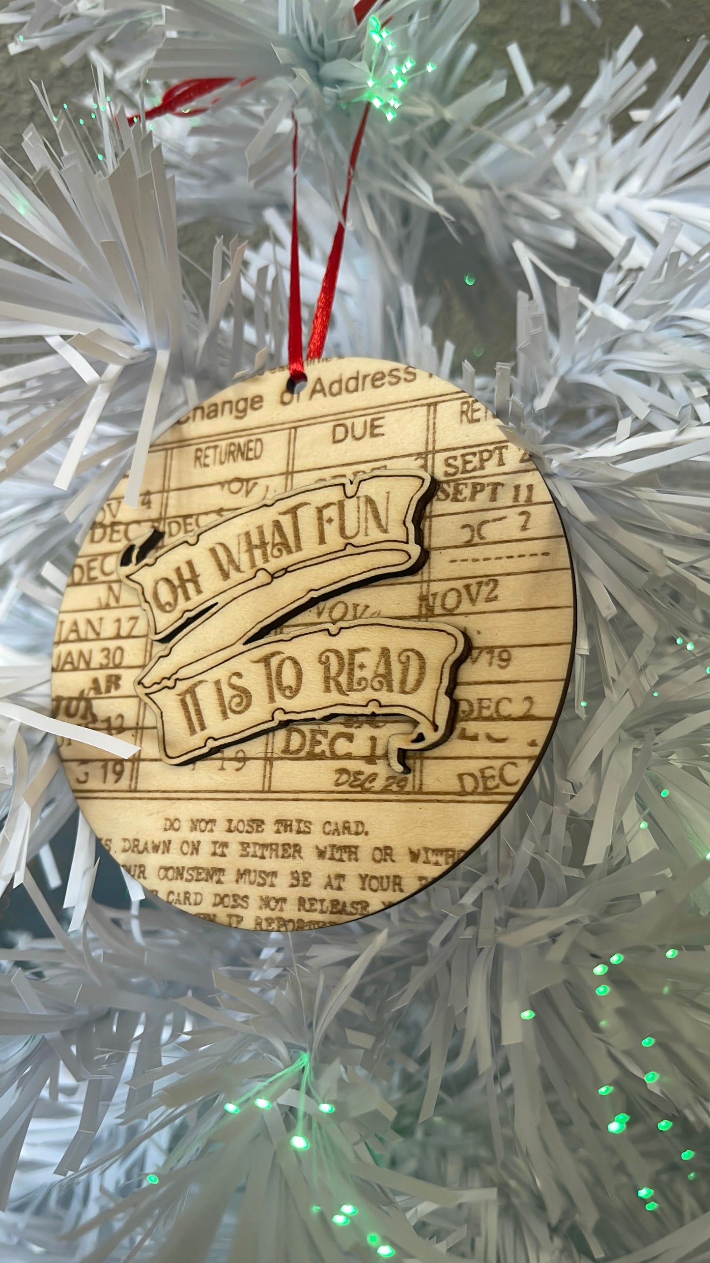 What fun it is to read ornament