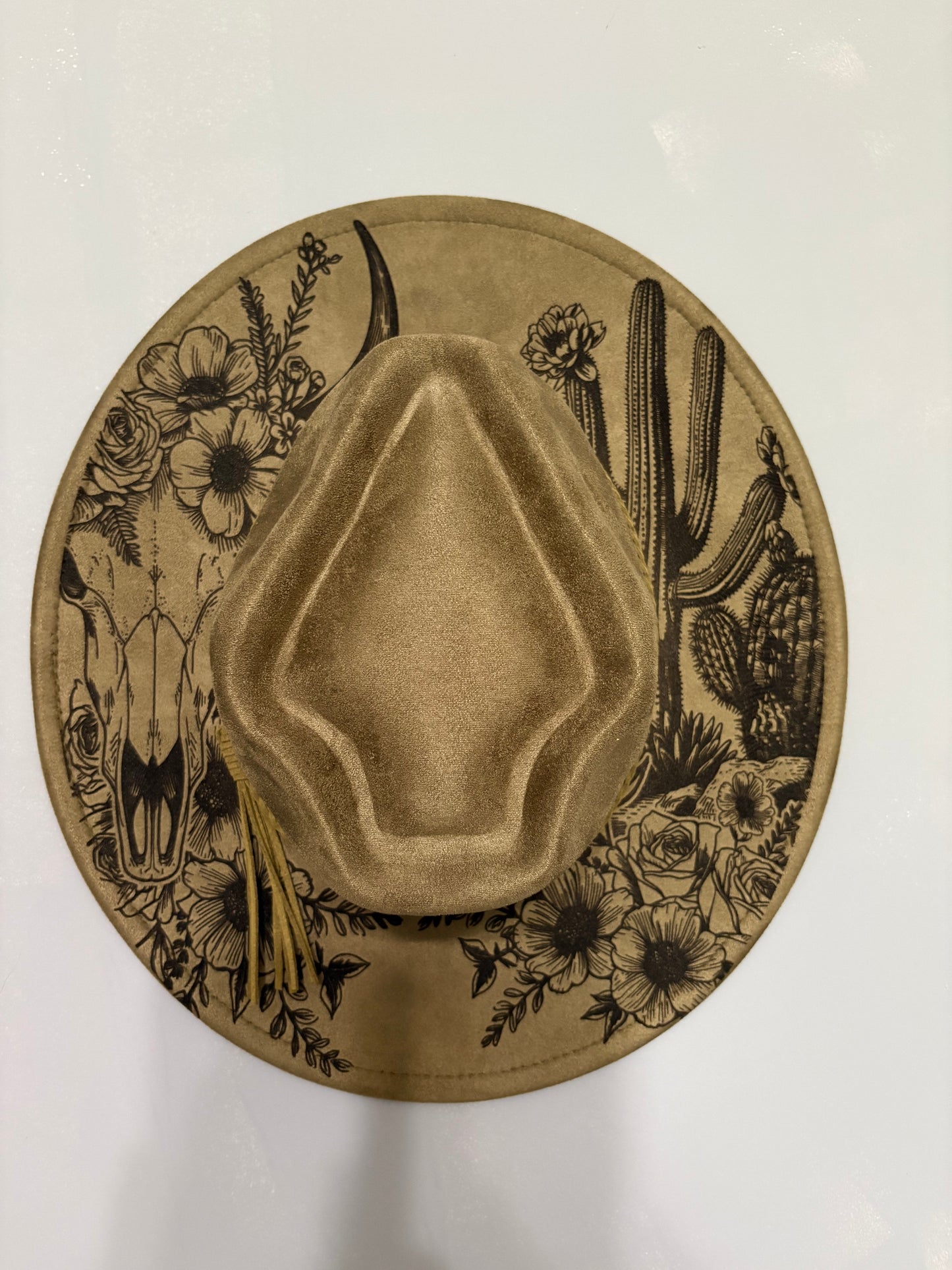Western skull and cactus laser engraved hat.