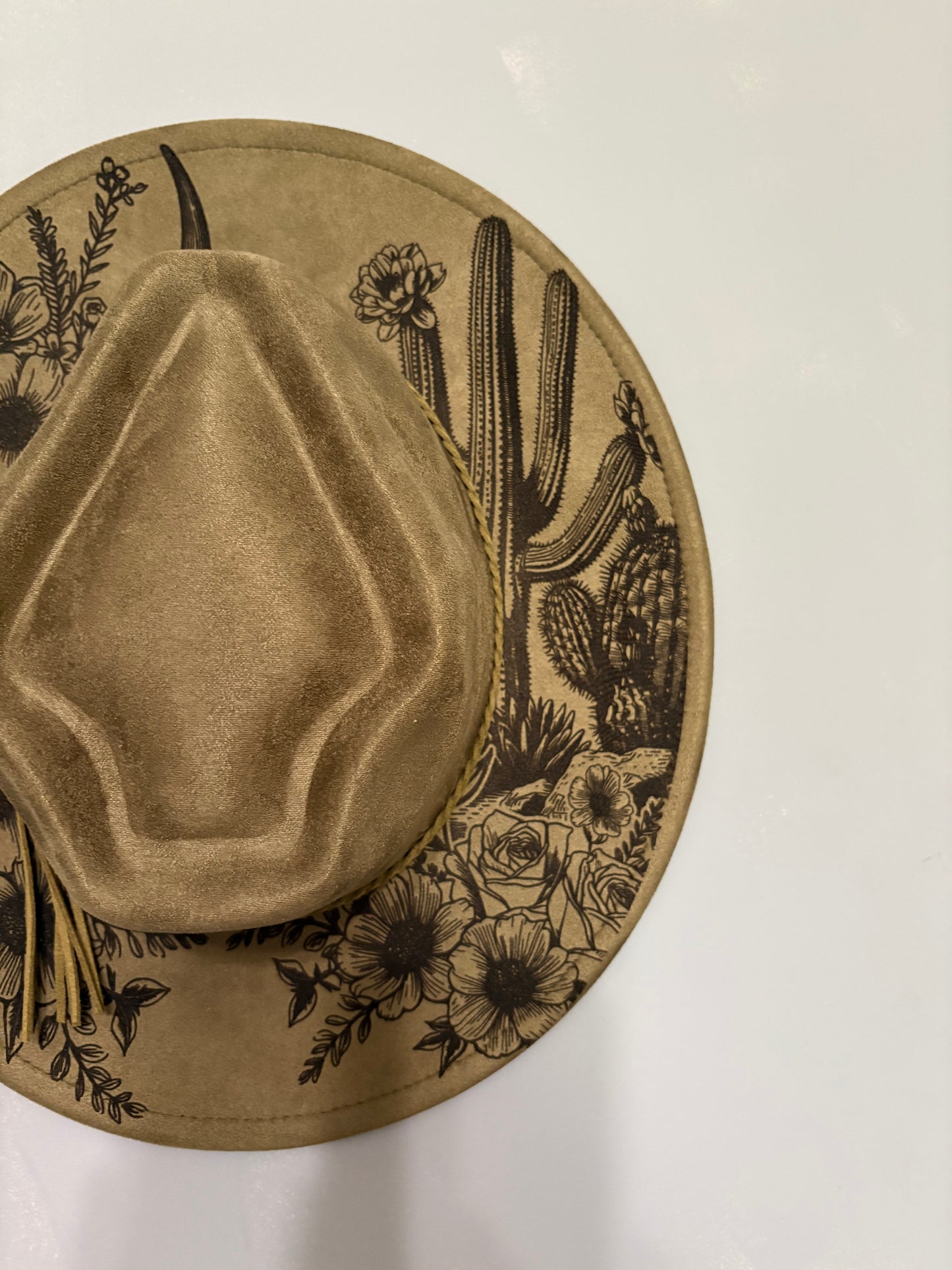 Western skull and cactus laser engraved hat.