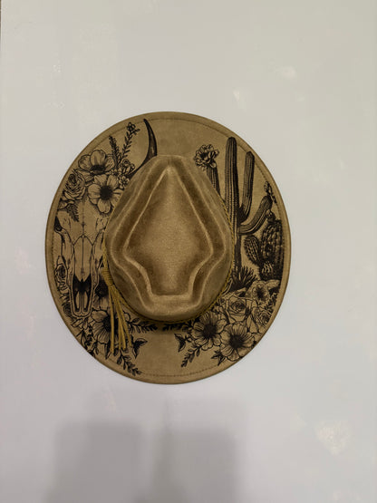 Western skull and cactus laser engraved hat.